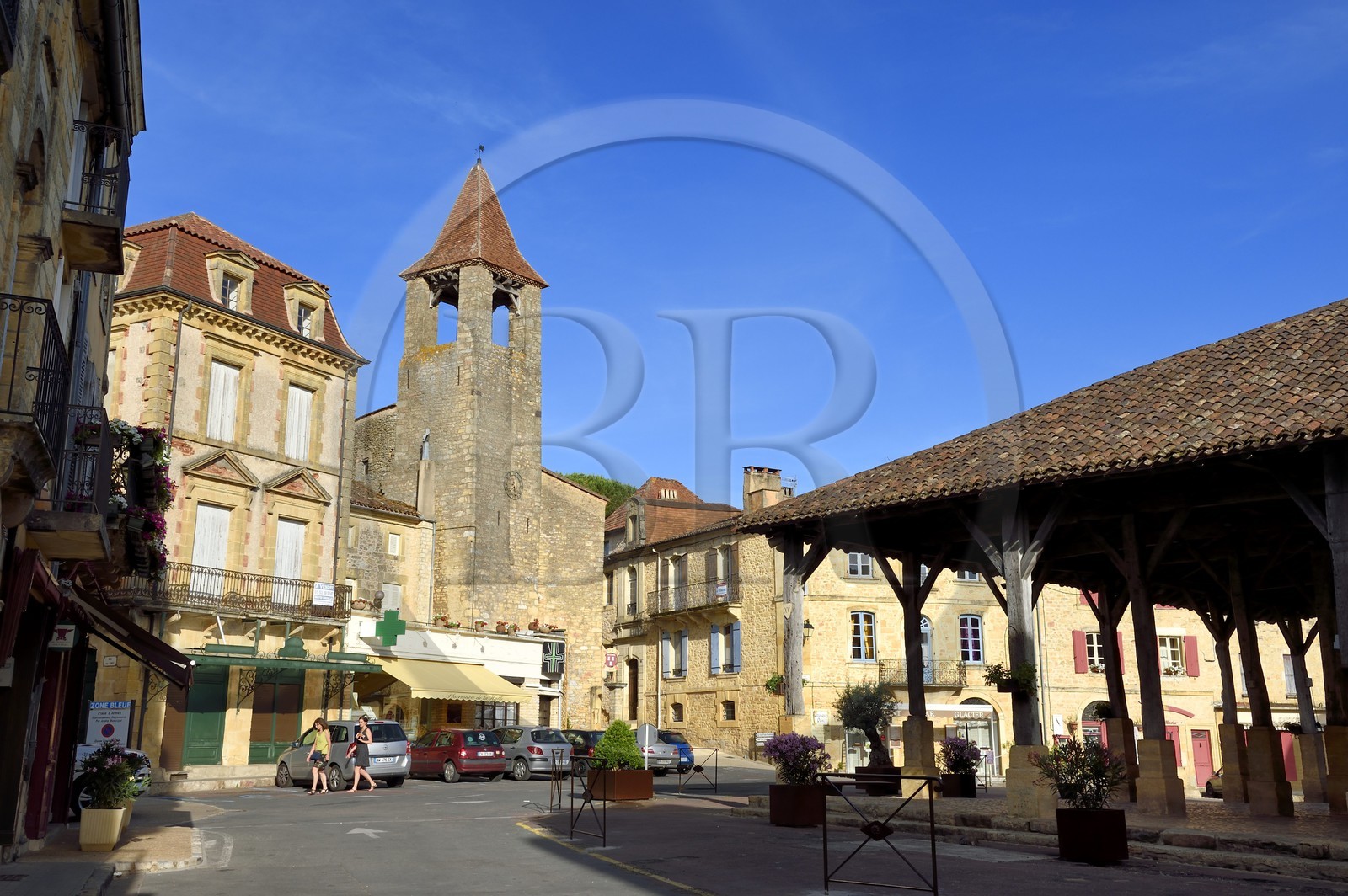 France, Dordogne, Perigord Noir, Belves, labelled Les Plus Beaux Villages de France (The Most Beautiful Villages of France), the Filhols Tower of 11th century housing the tourist office on Place d'Armes and 15th century covered market