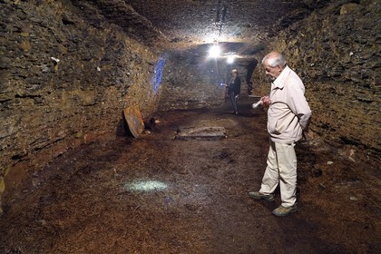 France, Puy de Dome, Clermont Ferrand, rue Pascal, Hotel Martial de Grandseigne, member of the ACAVIC association (Amis des Caves du Vieux Clermont) in the tuff cellars on three levels, cellar where Saint-Nectaire was matured