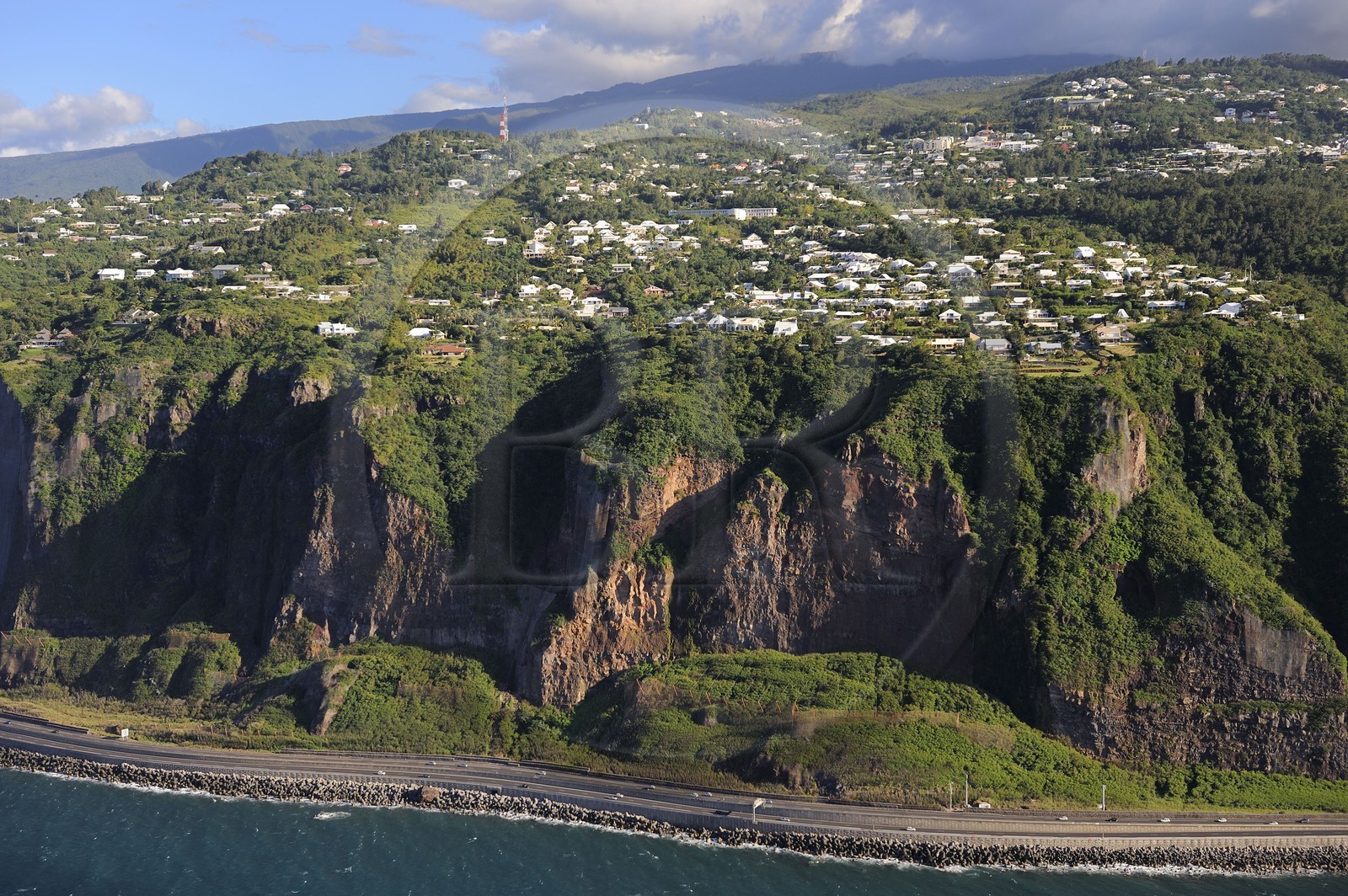 France, Reunion Island (French overseas department), the Route du Littoral (Coastal Road) at the foot of the cliffs between Le Port and Saint Denis (aerial view)