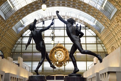 France, Paris, Orsay museum, sculpture A find in Pompei (1863) by Hippolyte Moulin on the left and sculpture Victor in Cockfight (1864) by Alexandre Falguière on the right