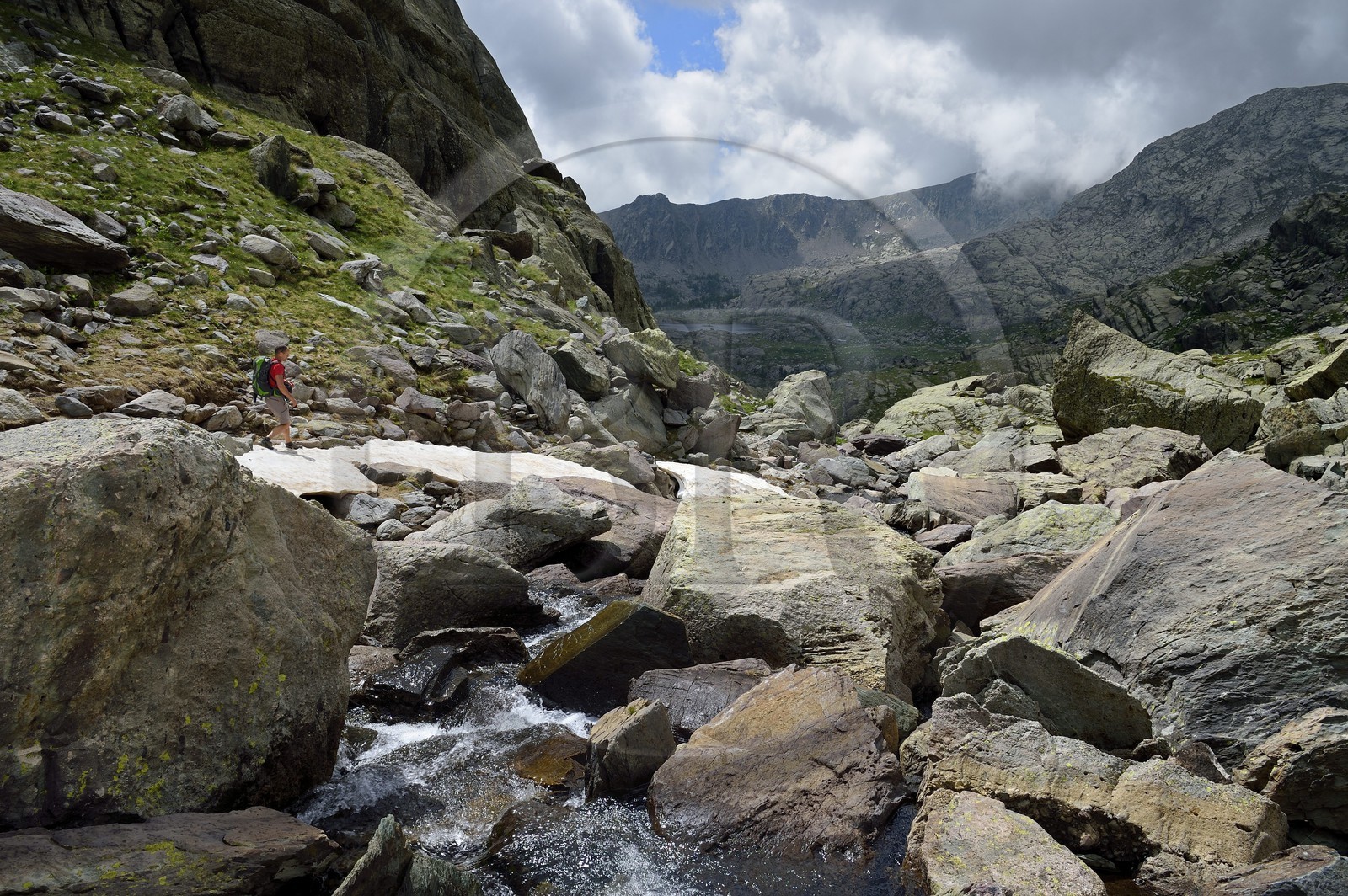 France, Alpes-Maritimes, parc national du Mercantour (Mercantour National Park), the Vallee des Merveilles (Valley of Wonders) scattered with thousands of rupestral engravings of the Bronze Age, hiker on the trail GR 52