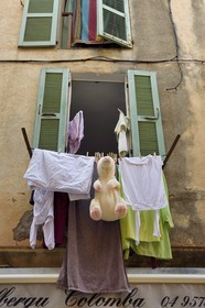 France, Corse du Sud, Bonifacio, Upper Town, clean linen drying in front of the window
