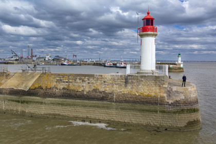 France, Loire-Atlantique, Saint-Nazaire, the west jetty lighthouse on the crab claw (nickname given to the southern entrance to the harbor basin by the two jetties)(aerial view)