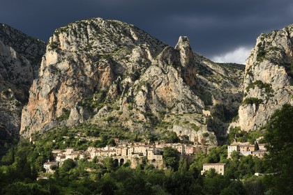 France, Alpes de Haute Provence, Parc Naturel Régional du Verdon, village of Moustiers Sainte Marie, labelled Les Plus Beaux Villages de France (The Most Beautiful Villages of France) and the Star of Moustier hanging on a chain several tens of meters above the ground