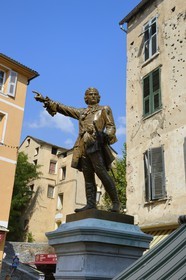 France, Haute Corse, Corte, the statue of a hero of the corsican revolution general Gaffori in front of his birthplace still riddled with bullet holes from 1750