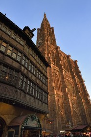 France, Bas Rhin, Strasbourg, old town listed as World Heritage by UNESCO, Notre Dame Cathedral, Christmas market (Christkindelsmarik) at the foot of Notre Dame Cathedral and the Maison Kammerzell