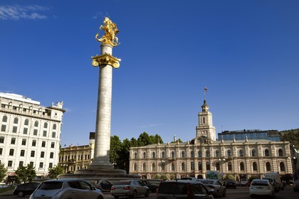 Georgia, Tbilisi, Freedom Square, Liberty Square, statue of St. George slaying the dragon and Tbilisi Sakrebulo (Tbilisi City Assembly building)