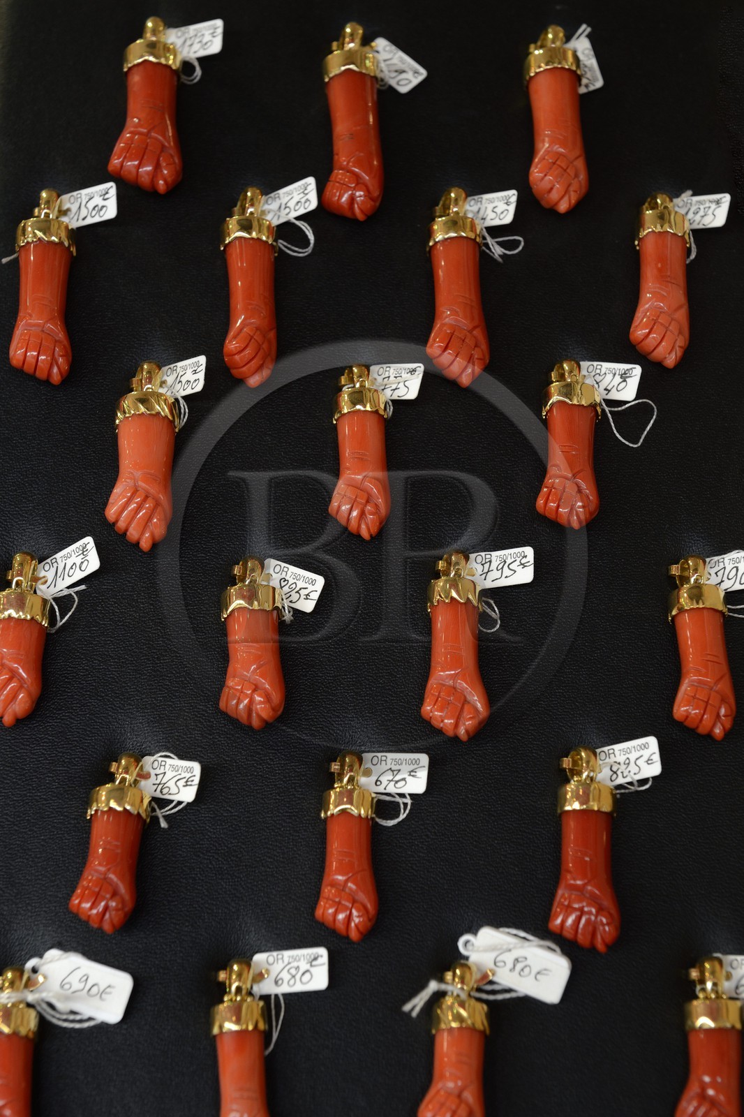 France, Corse du Sud, Ajaccio, hands made of coral to ward off the evil eye in the window of the shop La Maison du Corail rue Fesch
