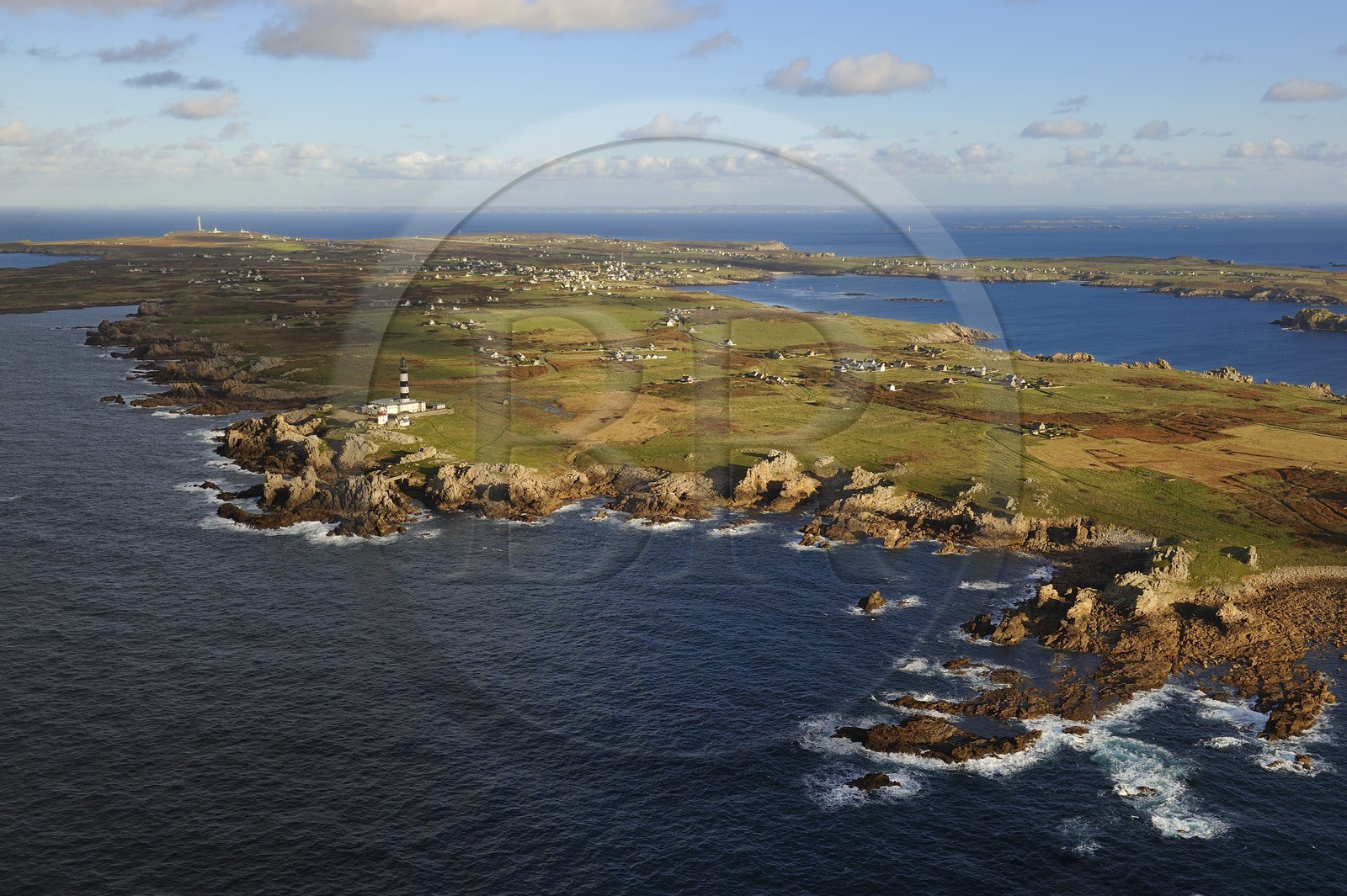 France, Finistere, the regional natural park of Armorica, Iroise sea, Ouessant island, Biosphere reserve (UNESCO), Creach Lighthouse and the West coast (aerial view)