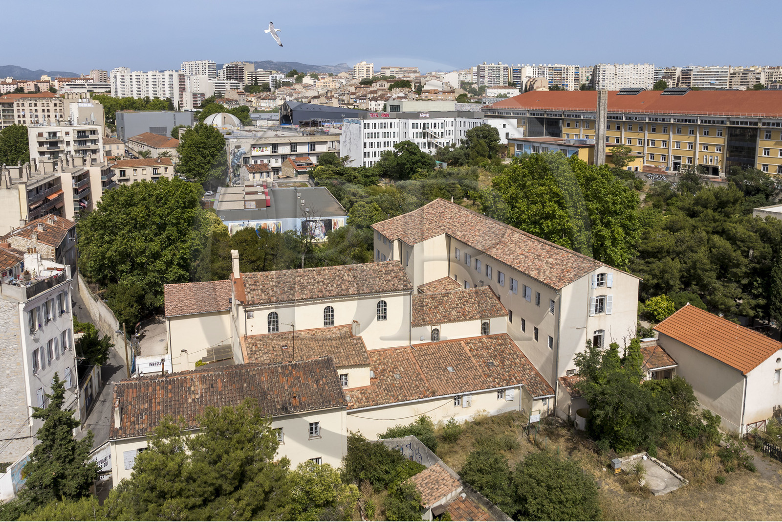 France, Bouches du Rhone, Marseille, Le Couvent, a large garden on rue Levat but also a hybrid cultural place with its city of artists, exhibitions, concerts and even projects open to the neighborhood (aerial view)