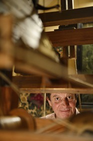 France, Rhone, Lyon, historical site listed as World Heritage by UNESCO, Vieux Lyon (Old Town), Saint George district, Ludovic de la Calle working on a Jacquard loom at the silk trade (Soierie) Saint-Georges