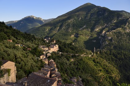 France, Alpes-Maritimes, Roya Valley (Nice hinterland), at the foot of the Mercantour National Park, perched village of Saorge, in the background left the Monastery of Saorge former Our Lady of Miracles Franciscans and right the former Notre Dame church better known today as the Madonna del Poggio
