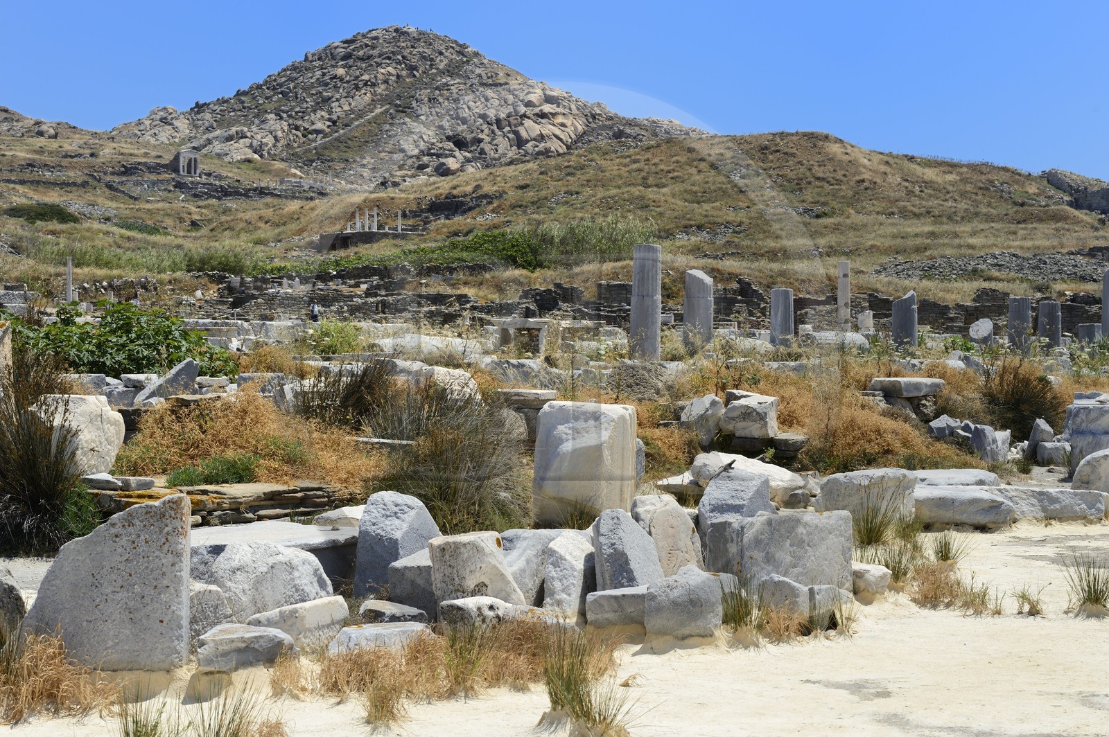 Greece, Cyclades islands, Delos, listed as World Heritage by UNESCO, the archaeological site of Delos, Apollo's Sanctuary, the most ancient city of the Aegean Sea, remains of the port area
