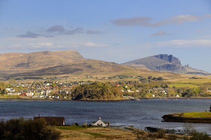 United Kingdom, Scotland, Highlands, Hebrides, Isle of Skye, Trotternish, harbour of Portree and the rocks of Storr in the background