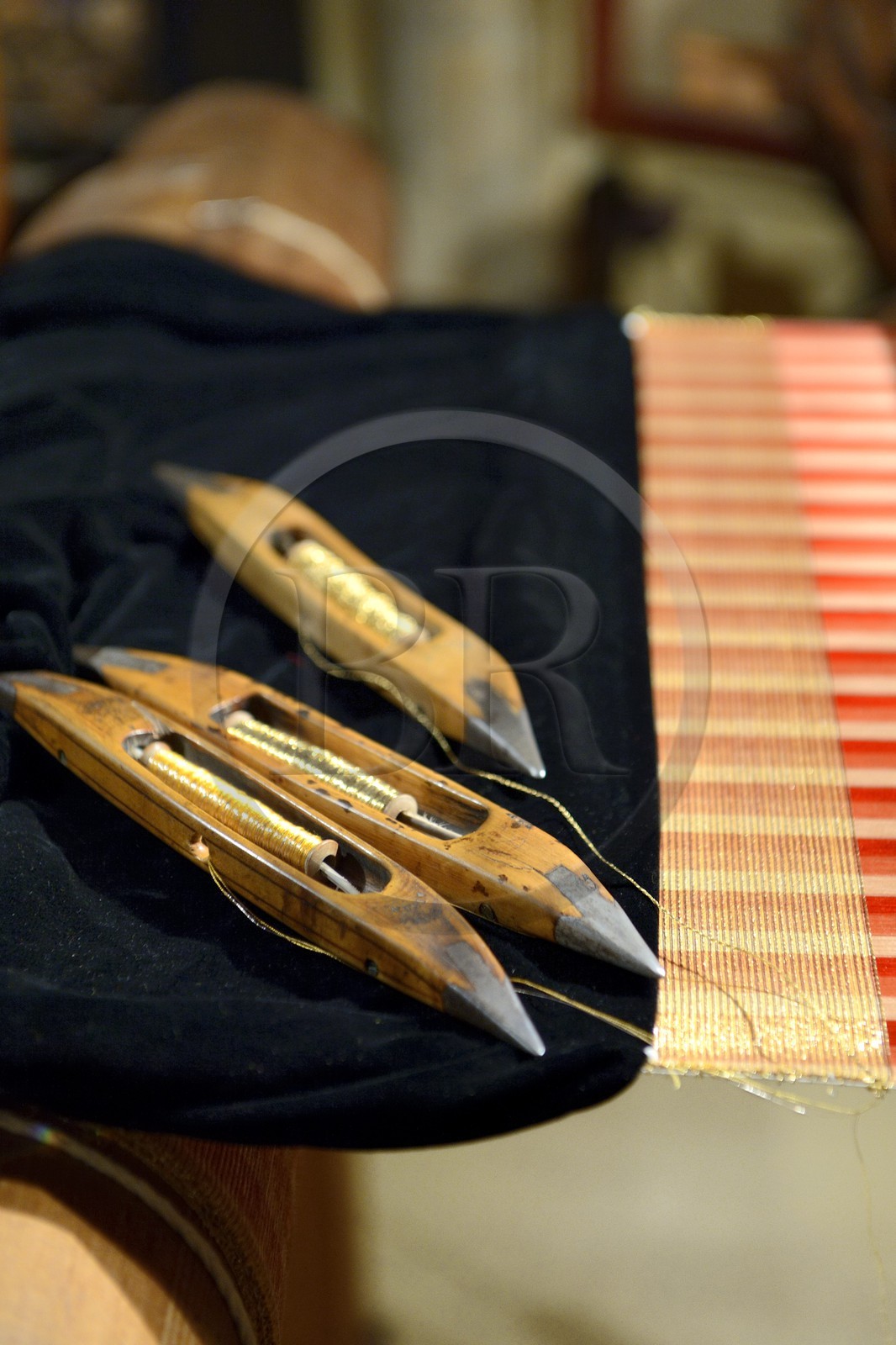 France, Rhone, Lyon, historical site listed as World Heritage by UNESCO, Vieux Lyon (Old Town), Saint George district, Jacquard loom at the silk trade (Soierie) Saint-Georges, shuttle for the passage of gold wire