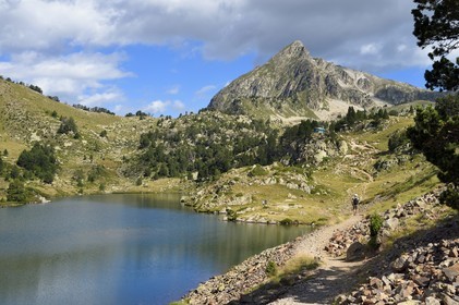 France, Hautes Pyrenees, Saint Lary Soulan and Vielle-Aure, hike on a variant of the GR10 between the Portet pass and the Bastan lakes on the edge of the Neouvielle nature reserve, middle Bastan lake and the Pic de Bastan in the background