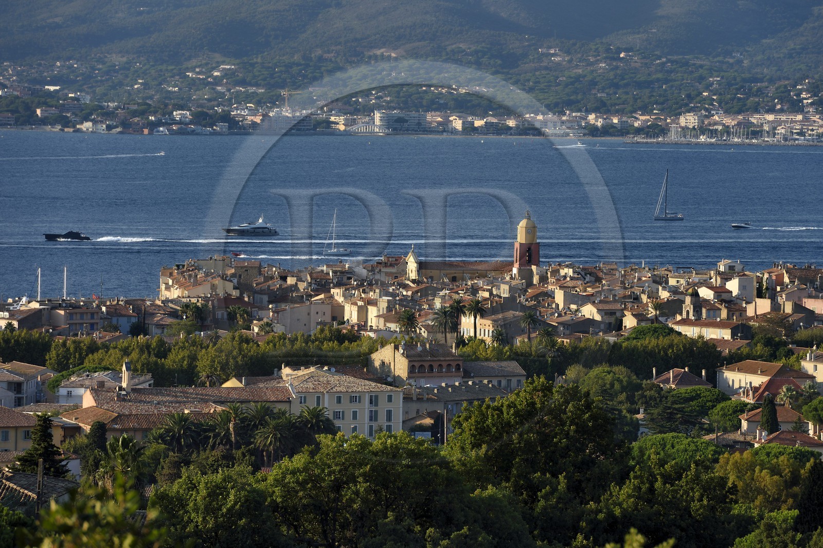 France, Var, Saint-Tropez, Notre Dame de l'Assomption parish church seen from the sainte-Anne chapel, Sainte-Maxime in the background