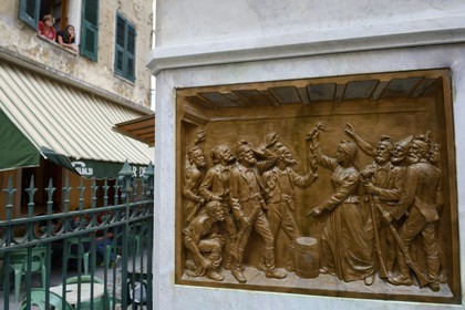 France, Haute Corse, Corte, low relief on the basement of general Gaffori's statue, hero of the corsican revolution (Gaffori square in the upper town), scene glorifying the courage of his wife Faustina Gaffori