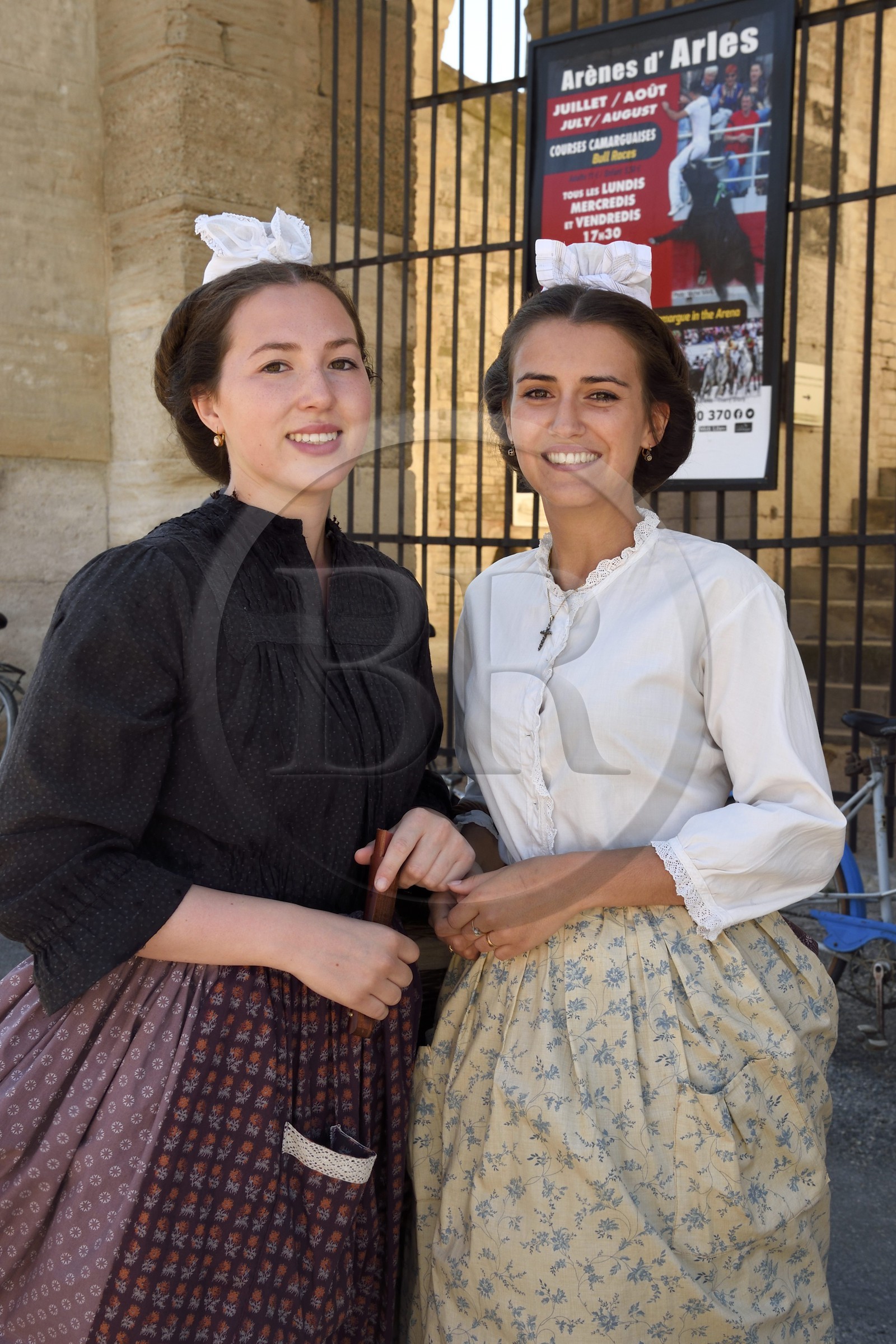 France, Bouches du Rhone, Arles, the course camarguaise of the Cocarde d'Or at the Arenas, young Arles inhabitants in traditional costume