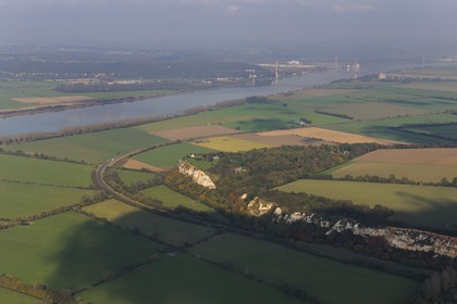 France, Eure, Marais-Vernier on the left bank of the Seine estuary, rocky promontory that separates the Marais-Vernier and the Risle Valley  and the Tancarville bridge in the background