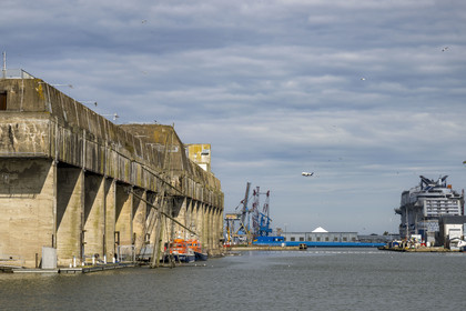 France, Loire Atlantique, Saint Nazaire, the former German submarine base built during the last world war border the dock of the harbour basin of Saint-Nazaire