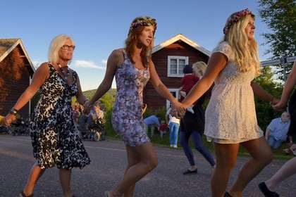 Sweden, Dalarna County, Leksand area, Midsummer celebrations in the tiny hamlet of Hjulbäck, crowns of flowers for unmarried girls