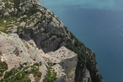 Norway, Rogaland, hikers on the Pulpit Rock (Preikestolen)  in the Lysefjord - fjord of Lysebotn (aerial view)