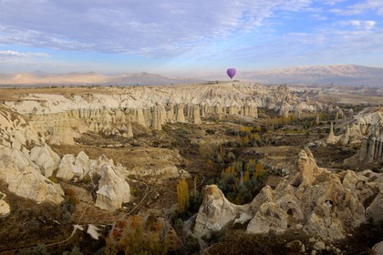 Turkey, Central Anatolia, Nevsehir Province, Cappadocia listed as World Heritage by UNESCO, near Uchisar, Love Valley, eroded landscape and fairy chimneys (aerial view)