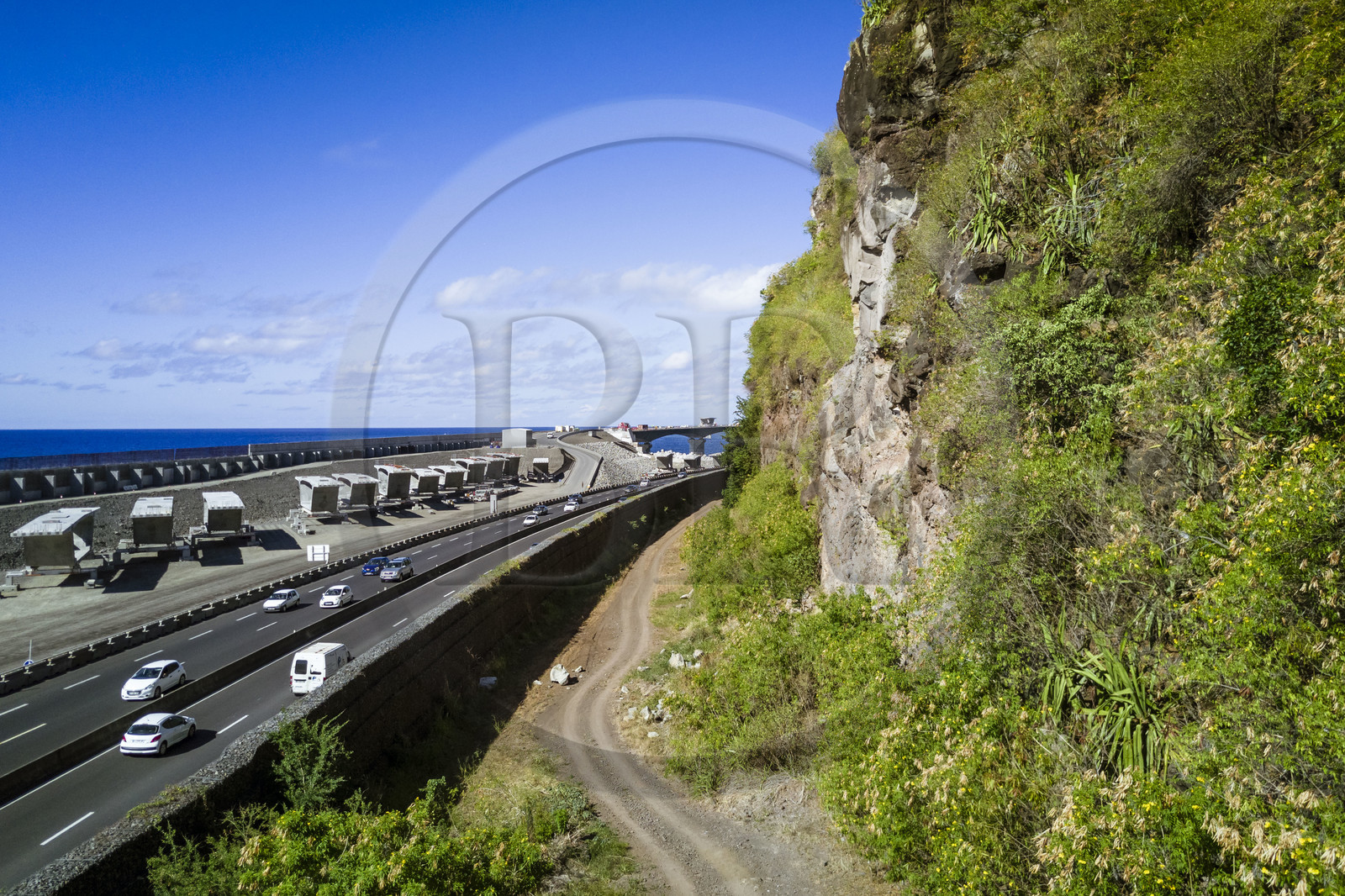 France, Reunion island (French overseas department), La Possession, construction of the New Coastal Route ( Nouvelle Route du Littoral - NRL) at la Grande Chaloupe, 5.4 km long maritime viaduct between the capital Saint-Denis and the main commercial port to the West  (aerial view)