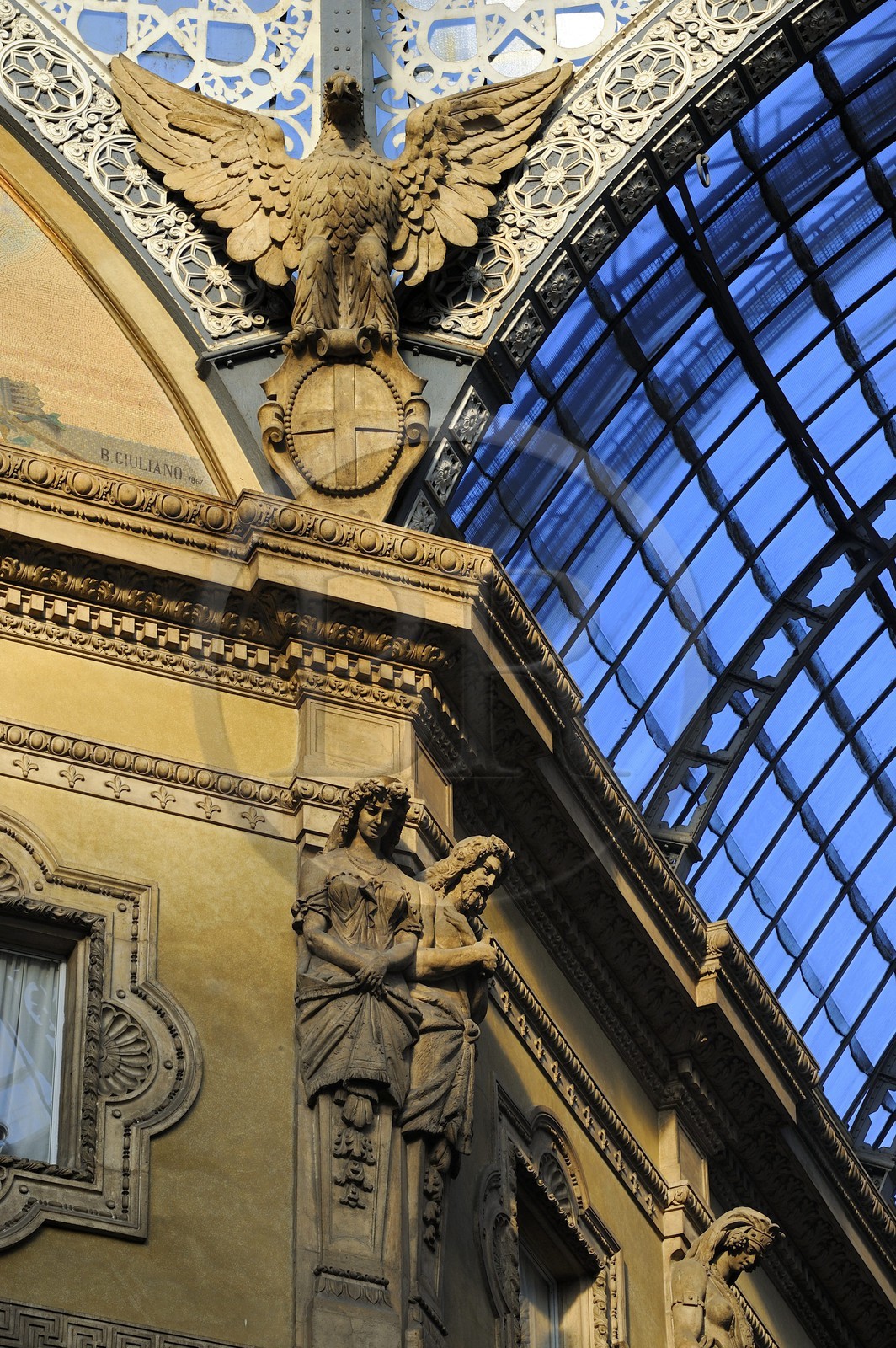 Italy, Lombardy, Milan, Vittorio Emmanuel II Gallery, shopping arcade built on the 19th century by Giuseppe Mengoni, detail of a facade