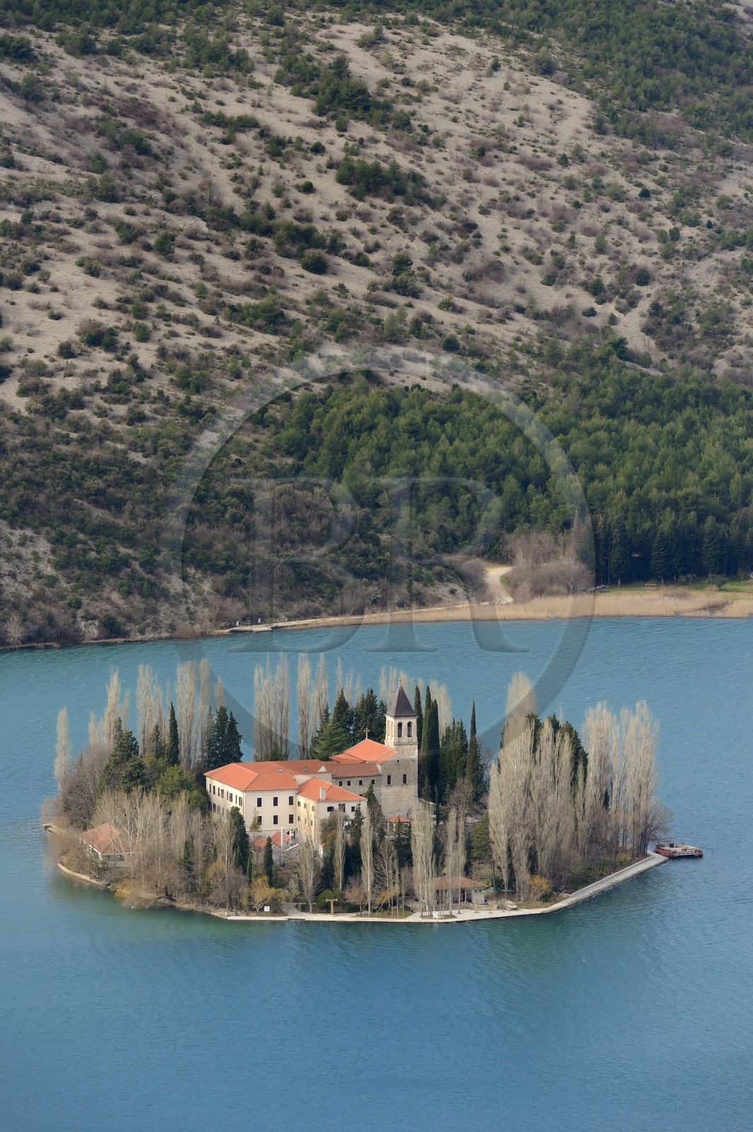Croatia, Dalmatia, Krka National Park where Krka River becomes Lake Visovac, the Visovac Franciscan Monastery on the island