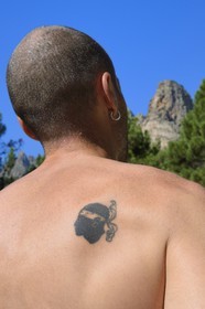 France, Corse du Sud, Alta Rocca, Aiguilles de Bavella (Bavella Needles), tattoo of the Moor's head emblem of Corsica