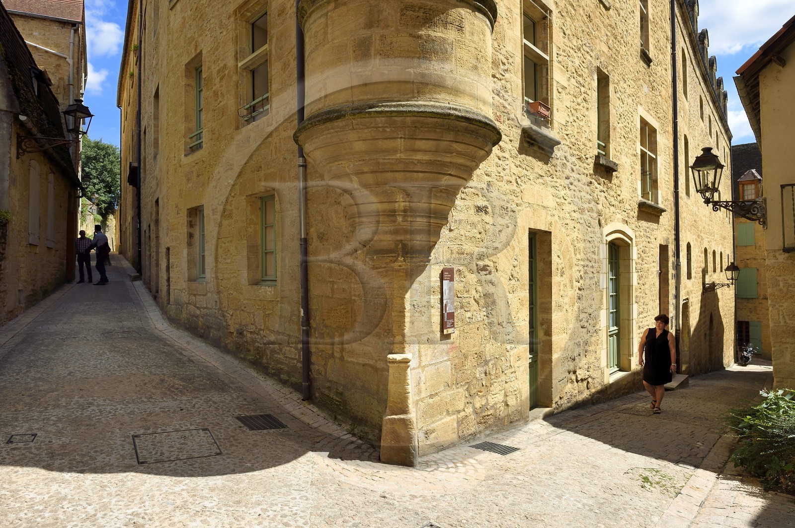 France, Dordogne, Perigord Noir, Dordogne valley, Sarlat la Caneda, house at the corner of rue de la Boetie and Rue Jean Jacques Rousseau, St. Clair Abbey from the 17th century former convent of Poor Clares