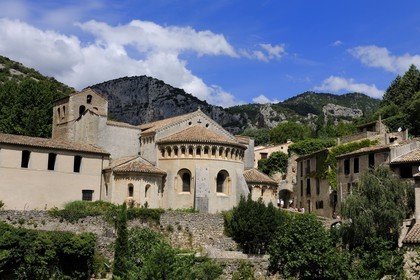France, Herault, Medieval town of Saint-Guilhem-le-Desert, a stop on el Camino de Santiago, pilgrimage route to Compostela, labelled Les Plus Beaux Villages de France (The Most Beautiful Villages of France), abbey of Gellone from the 11th century listed as World Heritage by UNESCO, triple apse of the church