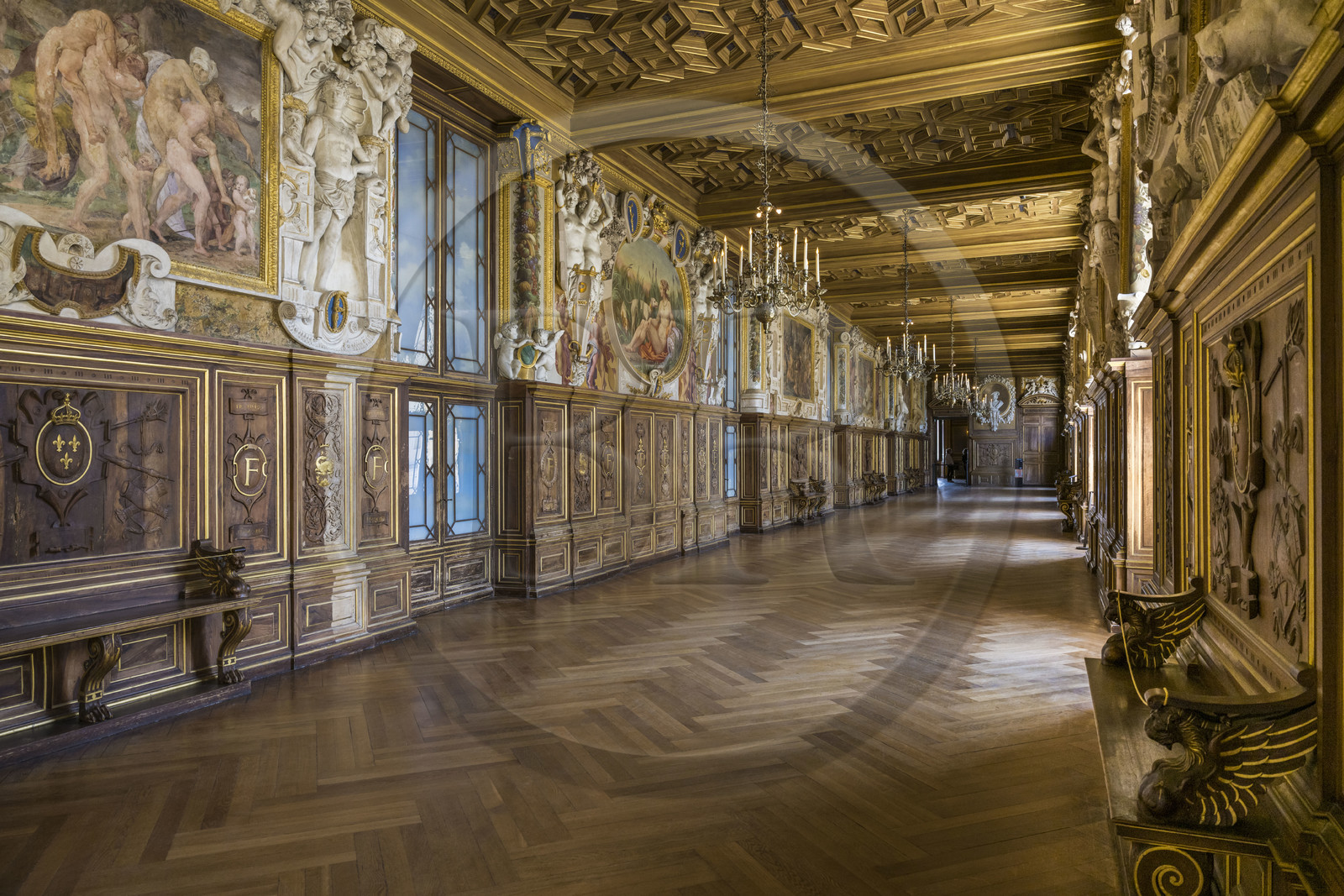 France, Seine-et-Marne, Fontainebleau, castle of Fontainebleau listed as World Heritage by UNESCO, the Francois 1er Gallery built between 1528 and 1530, decorated with paintings, paneling, frescoes and stuccos, carved walnut woodwork and a coffered ceiling
