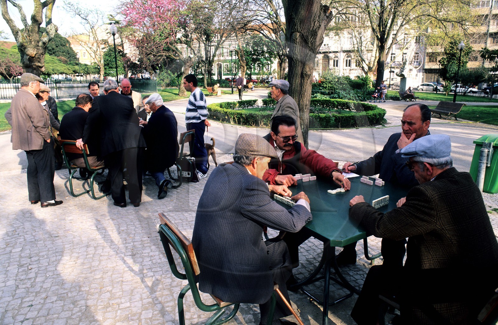 Portugal, Lisbon, Bairro Alto district, domino players on Real Square