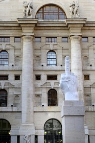 Italy, Lombardy, Milan, the finger drawn up in front of the Milan Stock Exchange by the sculptor Maurizio Cattelan