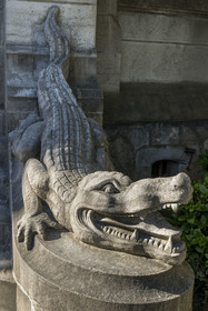 France, Pyrenees Atlantiques, Basque Country coast, Hendaye, Abbadia castle built in 1870 by Eugène Viollet-le-Duc for Antoine d'Abbadie d'Arrast, one of the two crocodiles guarding the main entrance