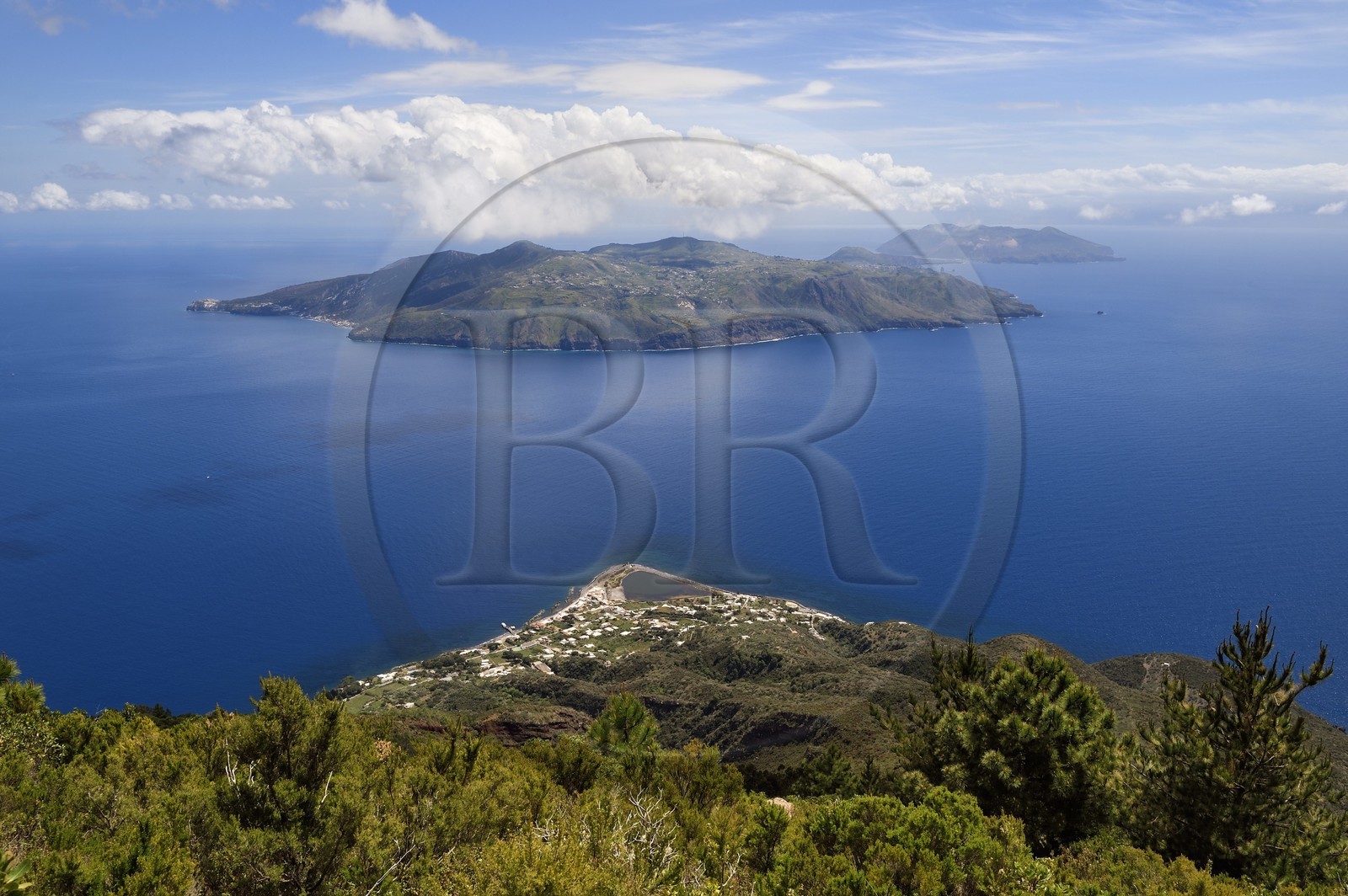 Italy, Sicily, Aeolian Islands, listed as World Heritage by UNESCO, the village of Lingua on Salina Island, the island of Lipari and then Vulcano in the background