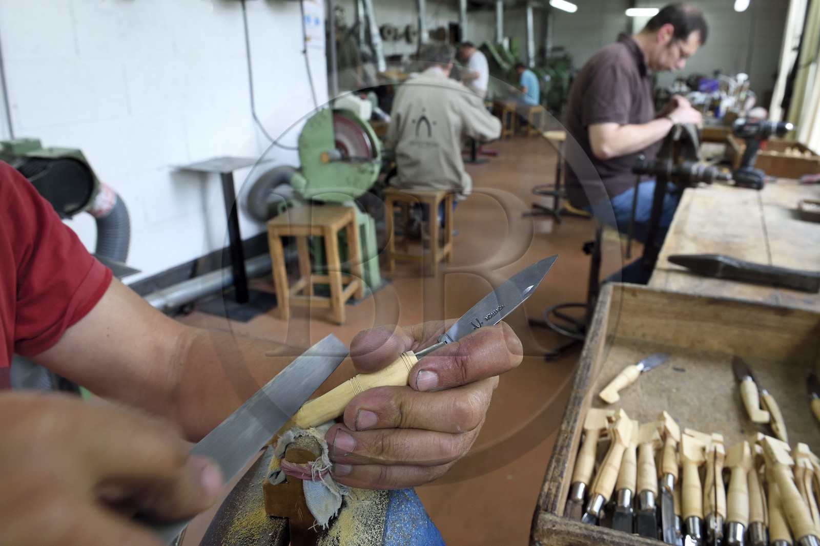 France, Dordogne, Périgord Vert, Nontron, manufacturing knives in the Coutellerie Nontronaise Factory, finishing the handle