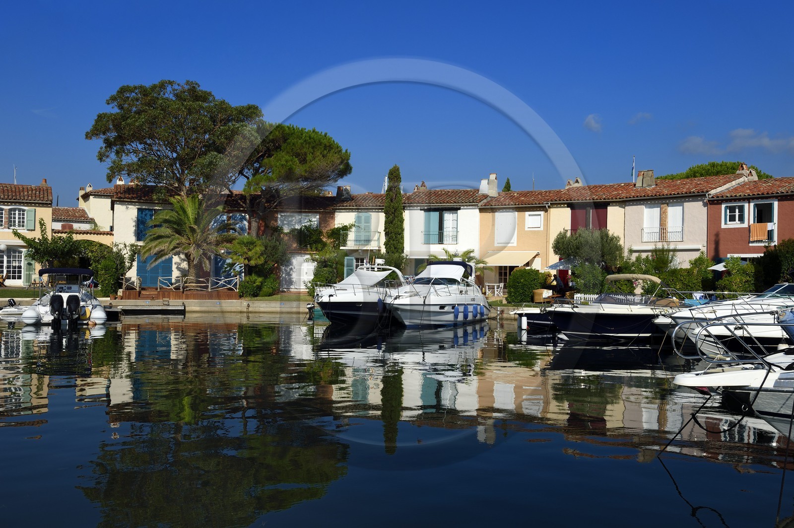 France, Var, Gulf of St Tropez, the Port Grimaud seaside town, houses with private jetty