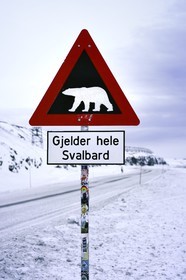 Norway, Svalbard, Spitzbergen, Longyearbyen, warning sign of potential danger of presence of polar bear, Gjelder hele Svalbard applies to all of Svalbard