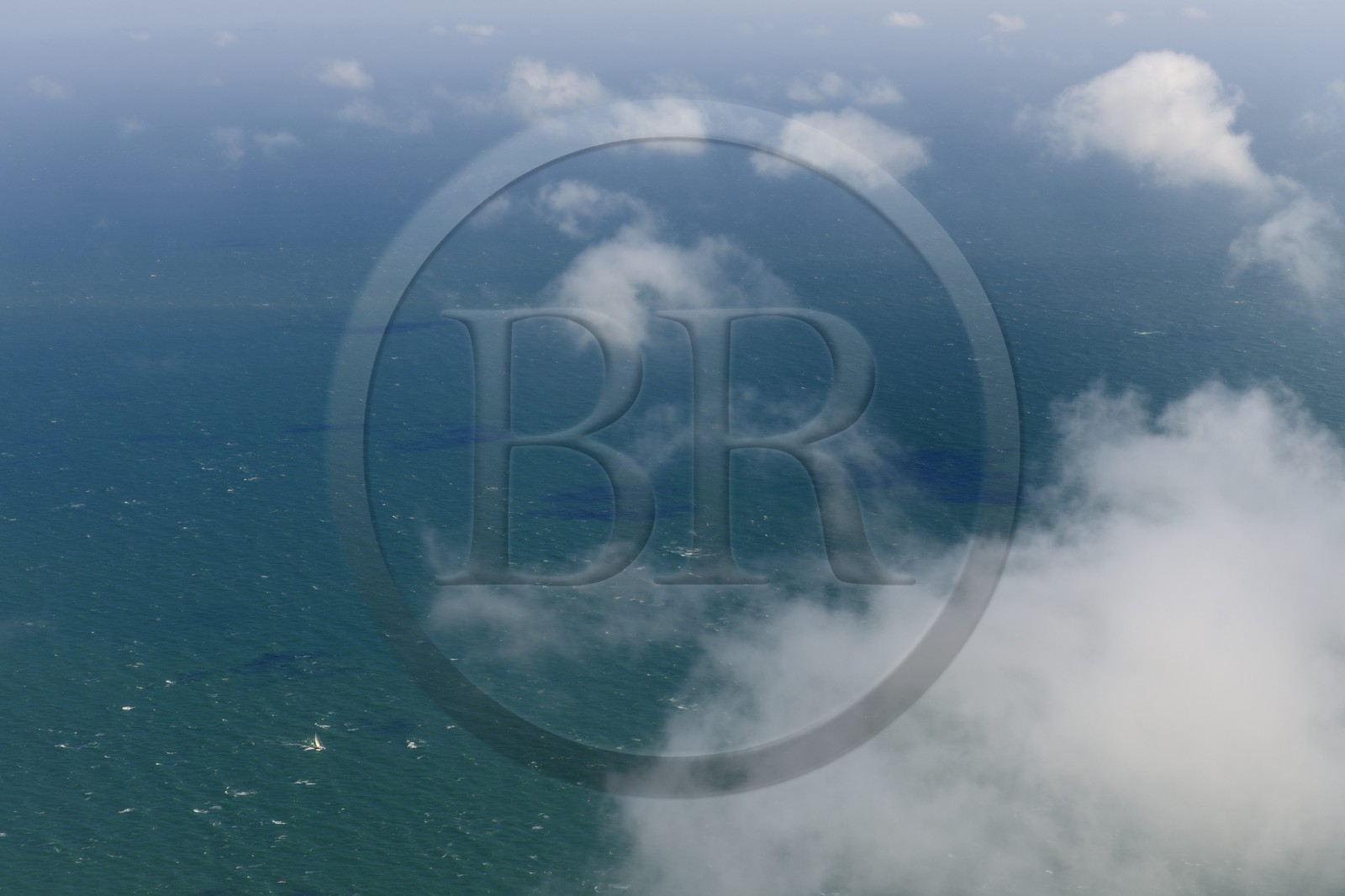 United Kingdom, England, sailboat sailing in the English Channel (aerial view)