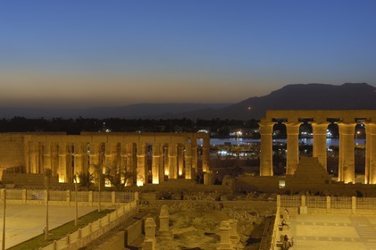 Egypt, Upper Egypt, Nile Valley, Luxor Temple at dusk, listed as World Heritage by UNESCO
