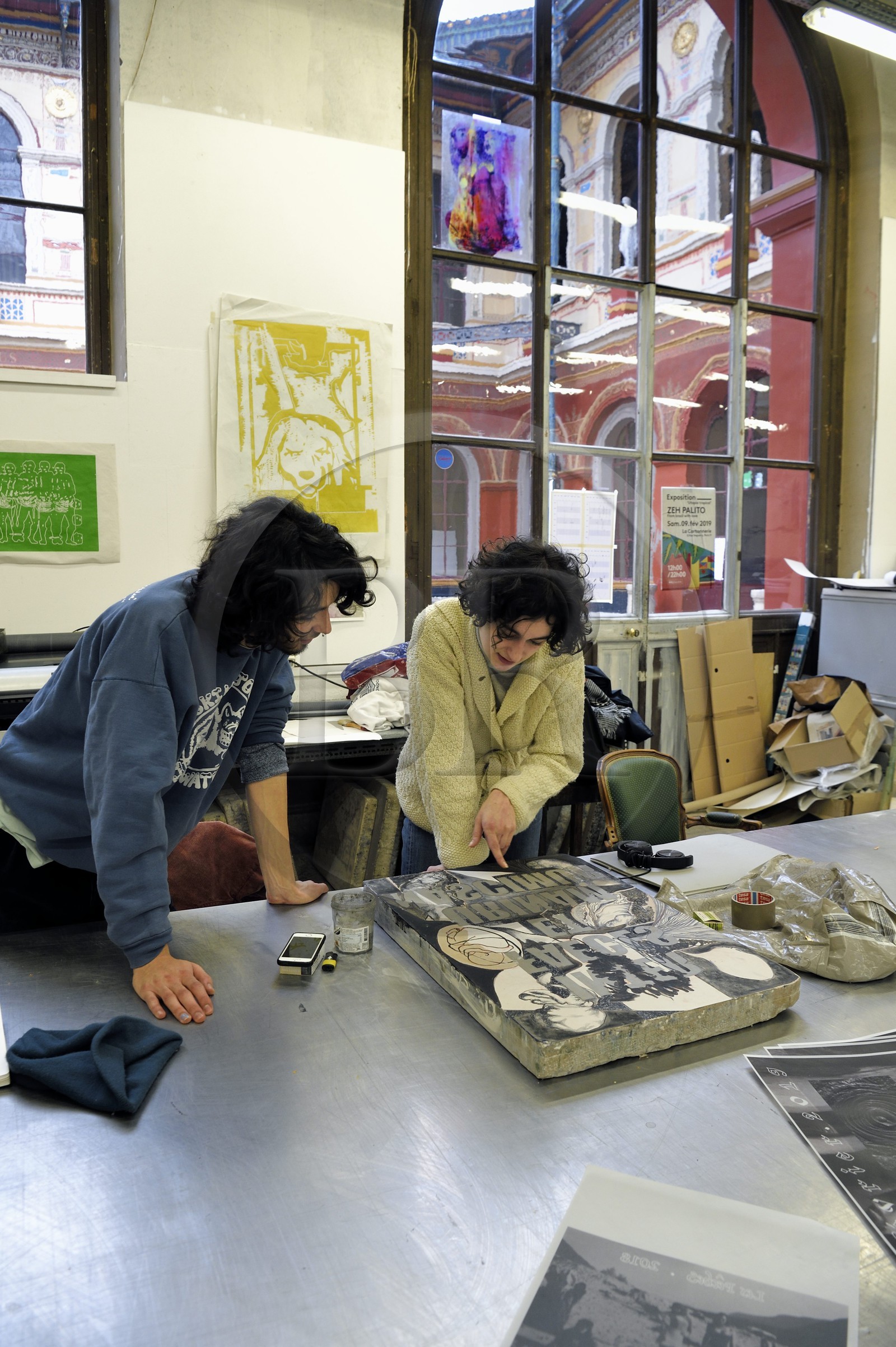 France, Paris, Saint Germain des Pres district, Ecole nationale superieure des Beaux-Arts (Fine Arts school), printing-multiple department in the Palais des Etudes (Palace of Studies), students in front of a lithography stone