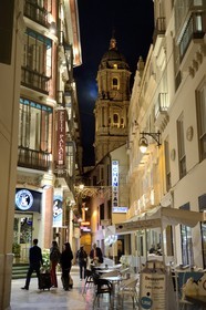 Spain, Andalusia, Malaga, the cathedral in the axis of a lane leading to the main street Calle Marques de Larios
