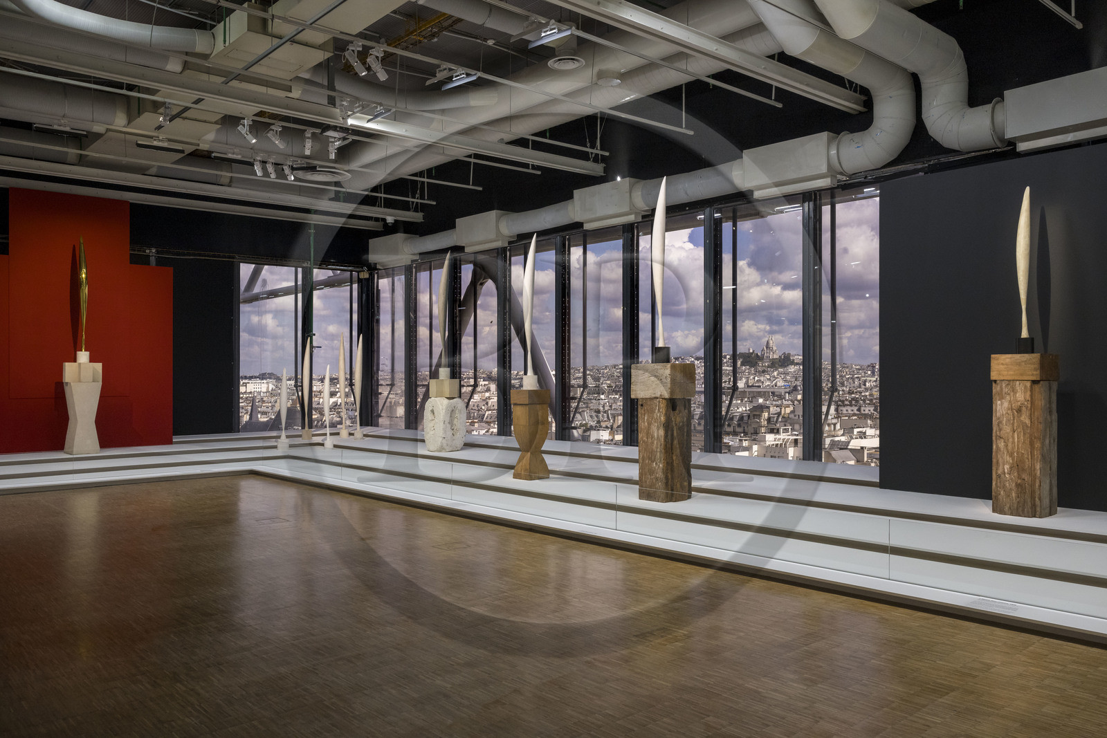 France, Paris, Les Halles district, the Pompidou Center also called Beaubourg, National Museum of Modern Art (MNAM), Brancusi retrospective exhibition, L'Envol, sculptures from the Birds in Space series, in the background the Sacré-Coeur basilica on the Butte Montmartre