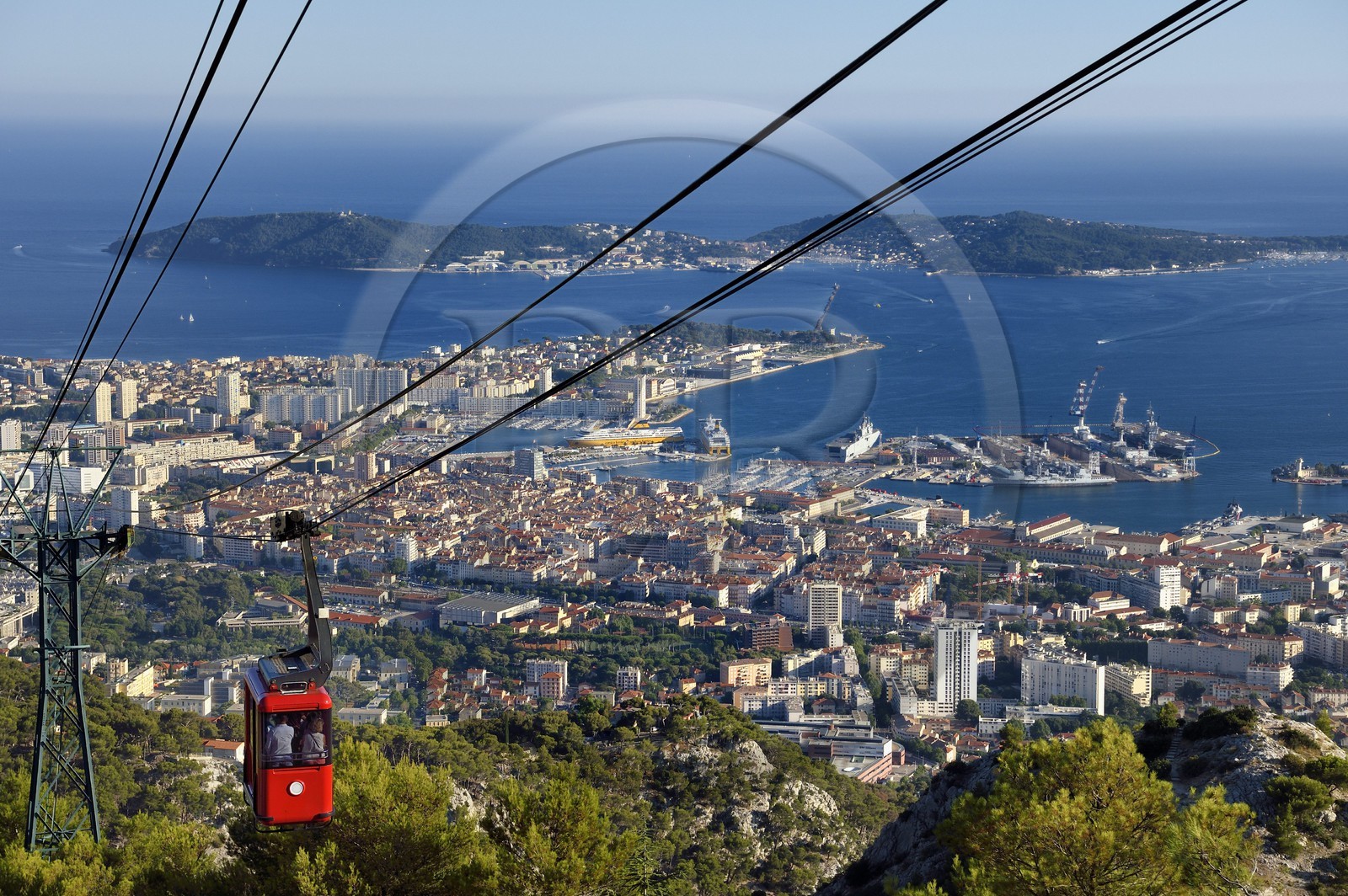 France, Var, Toulon, the Rade (Roadstead), cable car from the Mont Faron, the dry docks of the Grands Bassins Vauban from the naval base (Arsenal) and the peninsula of Saint Mandrier in the background