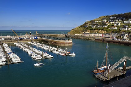 France, Seine Maritime, Pays de Caux, Cote d'Albatre, Fecamp, the old sailing ship Tante Fine docked in the harbor and the Cap Fagnet in the background