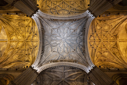 Spain, Andalusia, Seville, the cathedral, listed as World Heritage by UNESCO, the star-shaped vault, in front of the Great Chapel